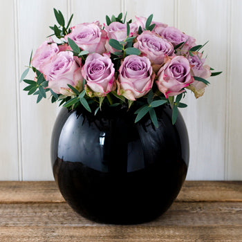 Image of Memory Lane roses and foliage in a black goldfish bowl vase