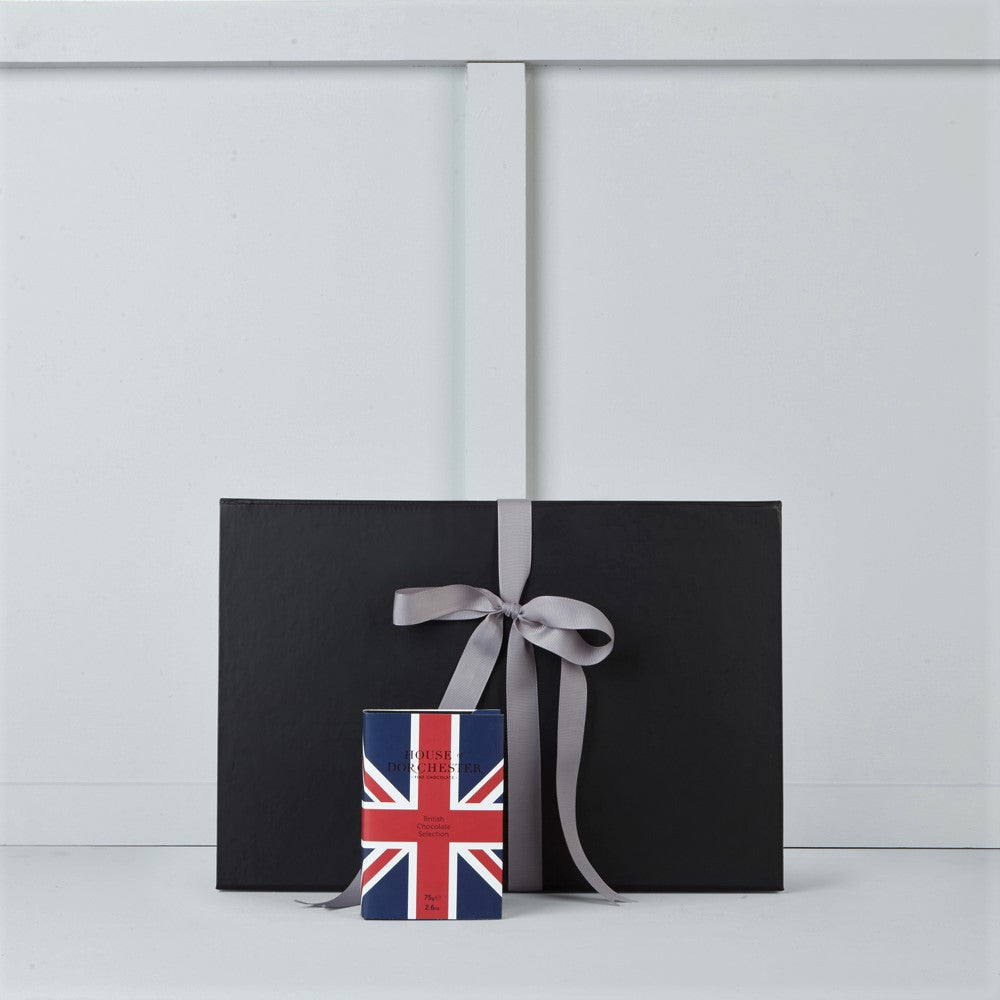 Image of book style Union Jack box filled with British selection chocolates by House of Dorchester